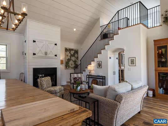 Chandelier, Fireplace, Interior, Living room, Recessed Lighting, Wood Texture Flooring