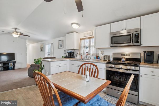 Interior, Kitchen, Stainless Steel Appliances, Tile Countertops, Wood Texture Flooring