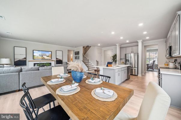 Dining room, Interior, Kitchen, Living room, Recessed Lighting, Stainless Steel Appliances, Wood Texture Flooring