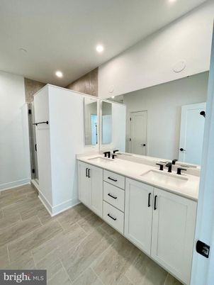 Bathroom, Dual Sink Vanities, Interior, Recessed Lighting, Wood Texture Flooring