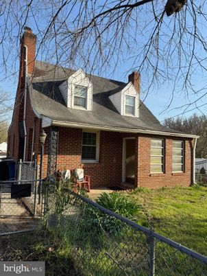 Exterior, Facade, Brick Facade, Cape Cod
