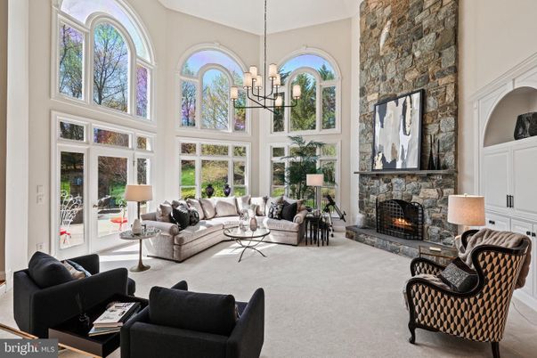 Chandelier, Fireplace, Interior, Living room, Stone Walls