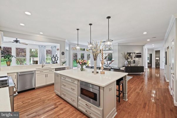 Dining room, Interior, Kitchen, Living room, Pendant Lights, Recessed Lighting, Stainless Steel Appliances, Wood Texture Flooring