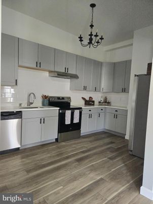 Chandelier, Interior, Kitchen, Stainless Steel Appliances, Wood Texture Flooring