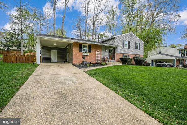 Attached, Backyard, Exterior, Facade, Brick Facade, Split Level