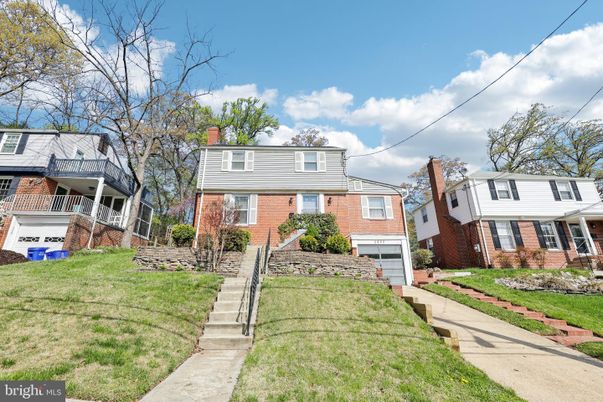 Attached, Exterior, Facade, Brick Facade, American Foursquare