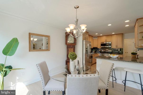 Chandelier, Dining room, Interior, Kitchen, Recessed Lighting, Stainless Steel Appliances, Wood Texture Flooring