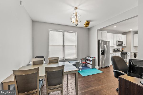 Dining room, Interior, Kitchen, Recessed Lighting, Stainless Steel Appliances, Wood Texture Flooring