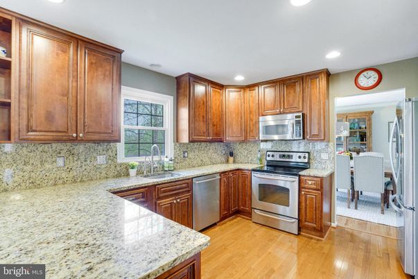 Dining room, Interior, Kitchen, Recessed Lighting, Stainless Steel Appliances, Wood Texture Flooring