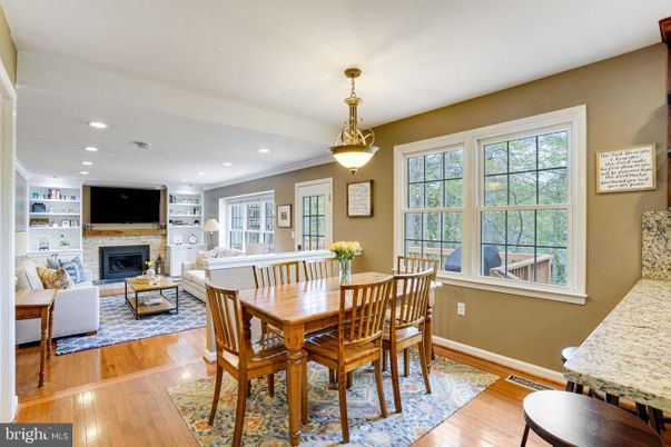 Dining room, Fireplace, Interior, Living room, Pendant Lights, Recessed Lighting, Wood Texture Flooring