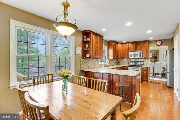Dining room, Interior, Kitchen, Recessed Lighting, Stainless Steel Appliances, Wood Texture Flooring