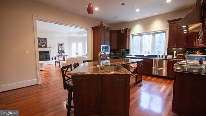 Fireplace, Interior, Kitchen, Pendant Lights, Recessed Lighting, Stainless Steel Appliances, Wood Texture Flooring