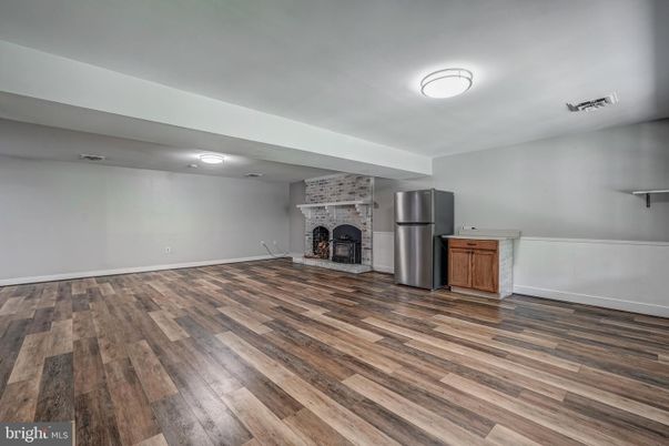 Empty room, Fireplace, Interior, Stone Walls, Wood Texture Flooring