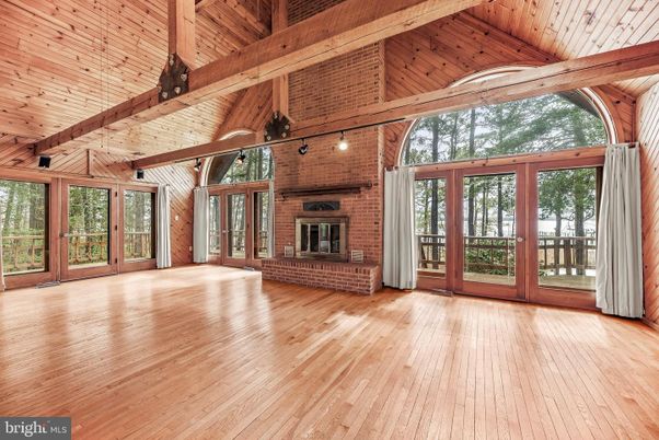 Empty room, Fireplace, Interior, Stone Walls, Wooden Beams, Wooden Ceilings, Wood Texture Flooring