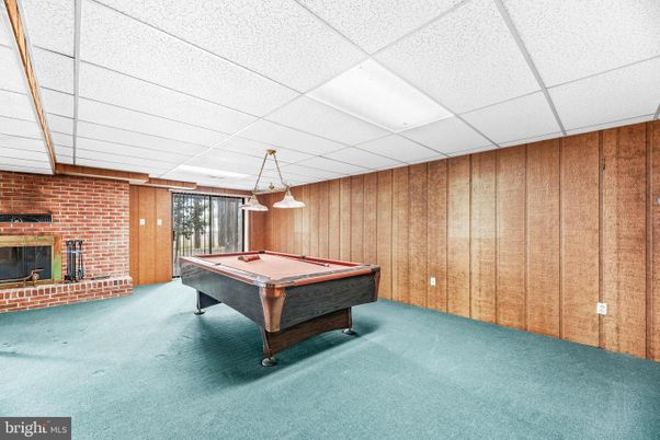 Billiard Table, Fireplace, Game Room, Interior, Pendant Lights, Stone Walls, Wooden Walls