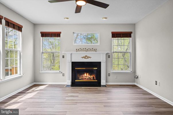 Empty room, Fireplace, Interior, Recessed Lighting, Wood Texture Flooring