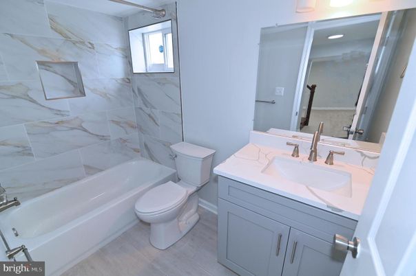Bathroom, Interior, Marble Walls, Recessed Lighting, Wood Texture Flooring