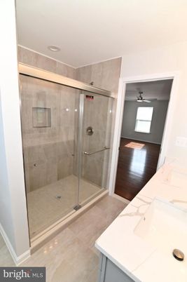 Bathroom, Glass Shower, Interior, Recessed Lighting, Wood Texture Flooring