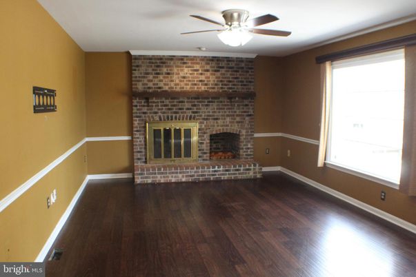 Empty room, Fireplace, Interior, Stone Walls, Wood Texture Flooring