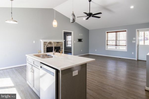 Empty room, Fireplace, Interior, Kitchen, Pendant Lights, Recessed Lighting, Wood Texture Flooring