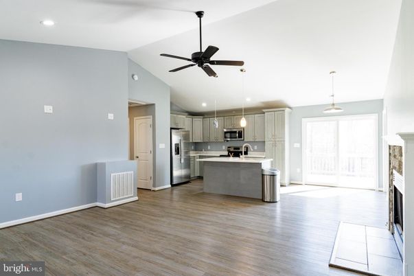 Fireplace, Interior, Kitchen, Pendant Lights, Recessed Lighting, Stainless Steel Appliances, Wood Texture Flooring