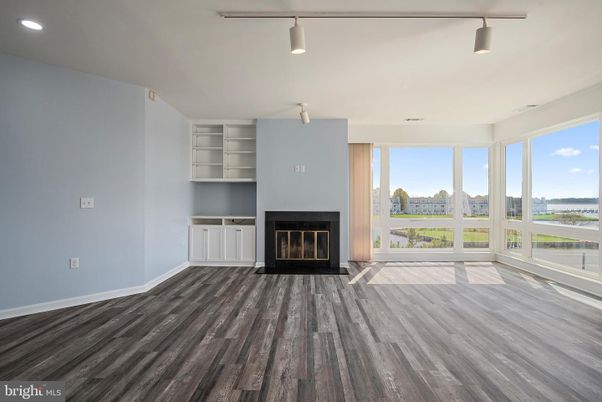 Empty room, Fireplace, Interior, Recessed Lighting, Wood Texture Flooring