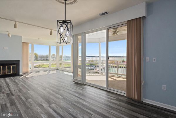 Empty room, Fireplace, Interior, Pendant Lights, Wood Texture Flooring