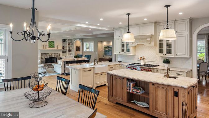 Chandelier, Dining room, Fireplace, Interior, Kitchen, Living room, Pendant Lights, Recessed Lighting, Stainless Steel Appliances, Wood Texture Flooring