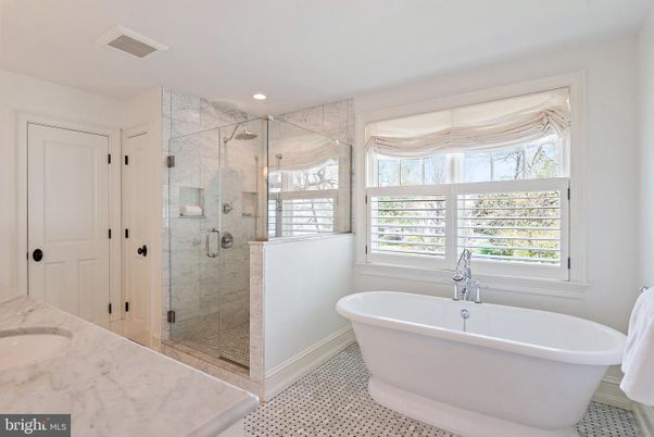 Bathroom, Free Standing Baths, Glass Shower, Interior, Marble Walls, Recessed Lighting