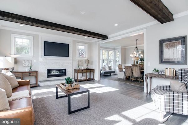 Chandelier, Dining room, Fireplace, Interior, Living room, Pendant Lights, Recessed Lighting, Wooden Beams, Wood Texture Flooring