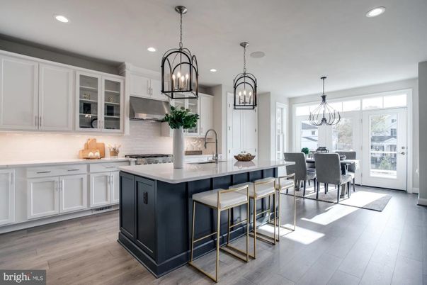 Chandelier, Dining room, Interior, Kitchen, Pendant Lights, Recessed Lighting, Stainless Steel Appliances, Wood Texture Flooring