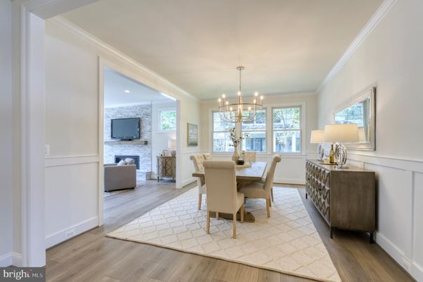 Chandelier, Dining room, Fireplace, Interior, Living room, Recessed Lighting, Stone Walls, Wood Texture Flooring