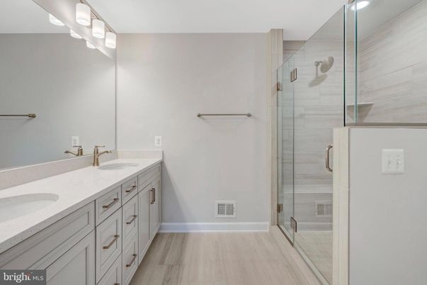 Bathroom, Dual Sink Vanities, Glass Shower, Interior, Wood Texture Flooring
