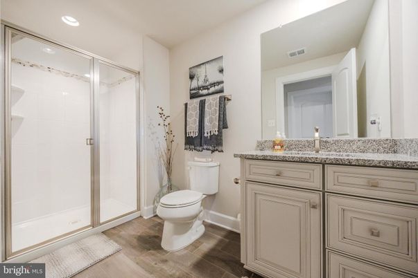 Bathroom, Glass Shower, Interior, Recessed Lighting, Wood Texture Flooring