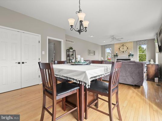 Chandelier, Dining room, Fireplace, Interior, Living room, Recessed Lighting, Wood Texture Flooring