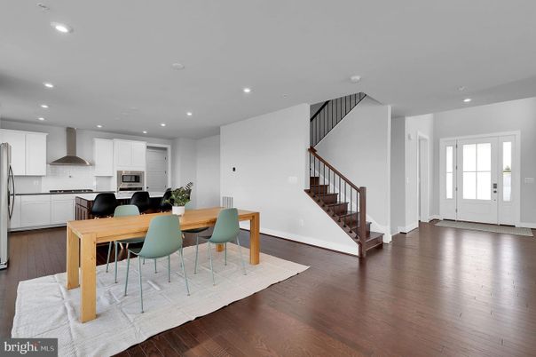 Dining room, Interior, Kitchen, Recessed Lighting, Stainless Steel Appliances, Wood Texture Flooring