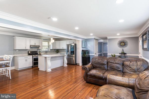 Dining room, Interior, Kitchen, Living room, Pendant Lights, Recessed Lighting, Stainless Steel Appliances, Wood Texture Flooring