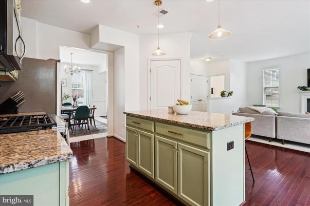 Chandelier, Dining room, Interior, Kitchen, Living room, Pendant Lights, Recessed Lighting, Wood Texture Flooring