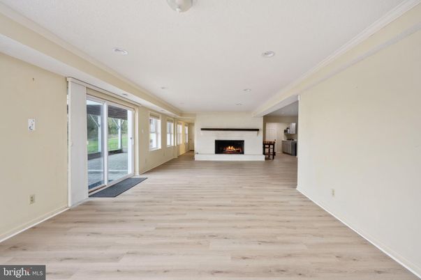 Empty room, Fireplace, Interior, Recessed Lighting, Wood Texture Flooring