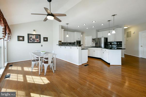 Dining room, Interior, Kitchen, Pendant Lights, Recessed Lighting, Stainless Steel Appliances, Wood Texture Flooring