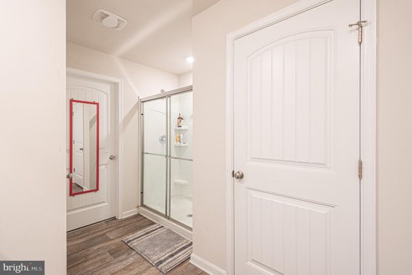 Bathroom, Glass Shower, Interior, Recessed Lighting, Wood Texture Flooring