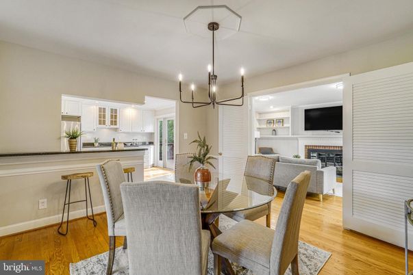 Chandelier, Dining room, Fireplace, Interior, Kitchen, Living room, Pendant Lights, Recessed Lighting, Wood Texture Flooring