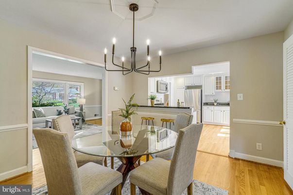Chandelier, Dining room, Interior, Kitchen, Living room, Stainless Steel Appliances, Wood Texture Flooring