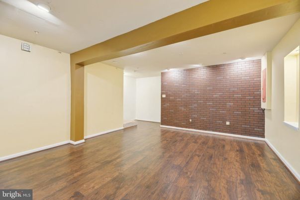 Empty room, Interior, Recessed Lighting, Stone Walls, Wood Texture Flooring