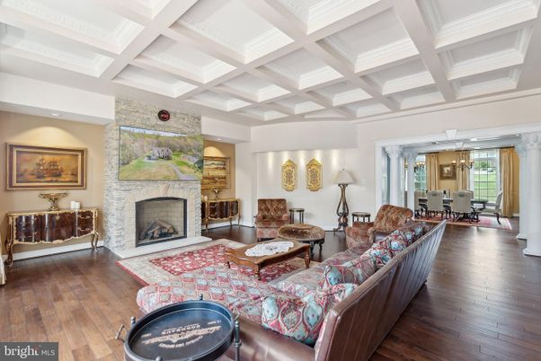 Dining room, Fireplace, Interior, Living room, Pendant Lights, Stone Walls, Wood Texture Flooring