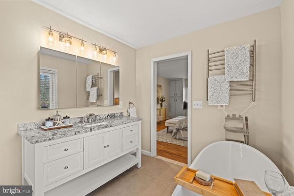 Bathroom, Bedroom, Dual Sink Vanities, Free Standing Baths, Interior, Wood Texture Flooring