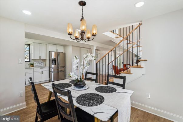 Chandelier, Dining room, Interior, Kitchen, Recessed Lighting, Stainless Steel Appliances, Wood Texture Flooring