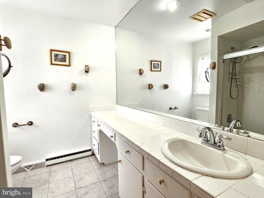 Bathroom, Dual Sink Vanities, Glass Shower, Interior, Recessed Lighting, Tile Countertops