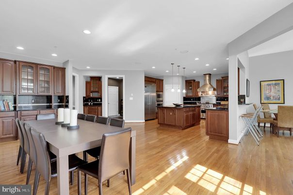 Dining room, Interior, Kitchen, Pendant Lights, Recessed Lighting, Stainless Steel Appliances, Wood Texture Flooring