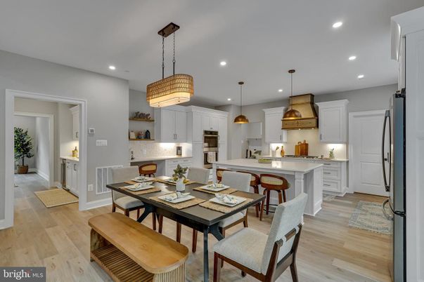 Dining room, Interior, Kitchen, Pendant Lights, Recessed Lighting, Stainless Steel Appliances, Wood Texture Flooring